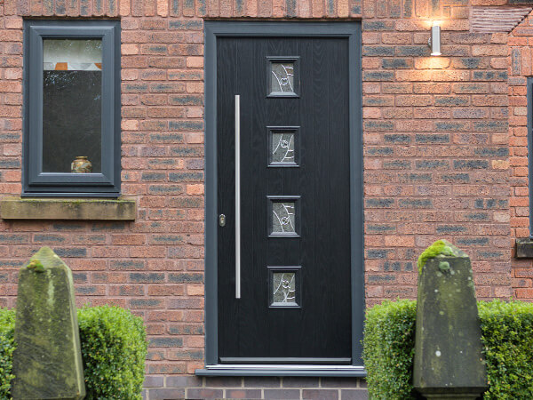 Black front door with handle bar